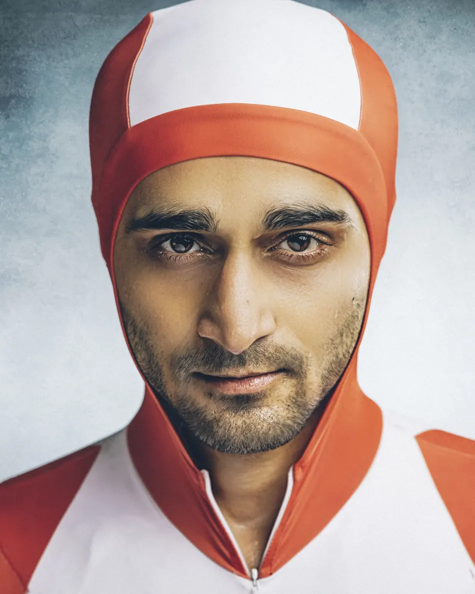 Vishwaraj Jadeja in a race hood, looking into the camera
