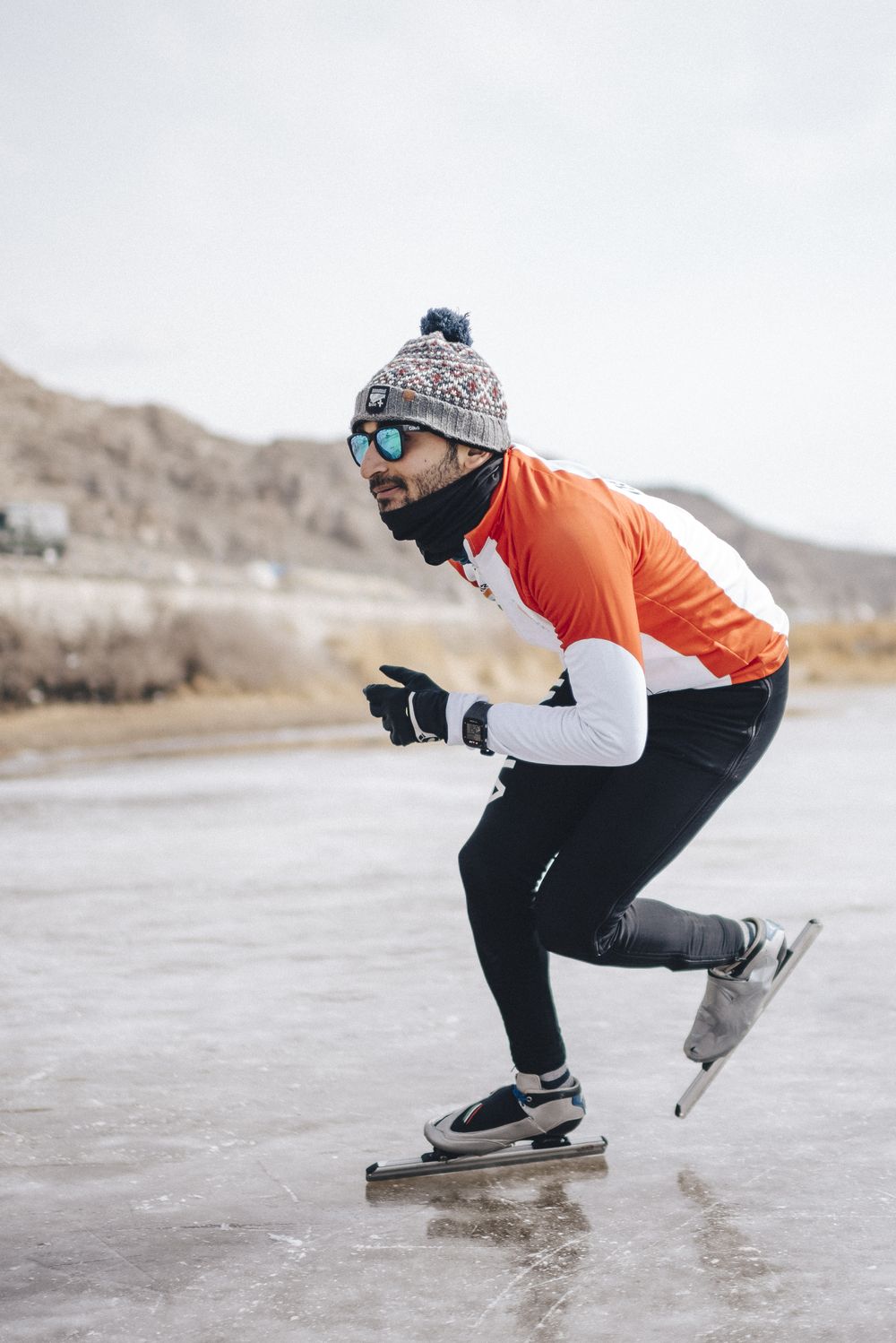 Vishwaraj in India kit driving off a long-track blade on a frozen lake in Ladakh